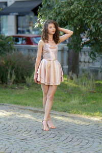 Sexy girl posing on pavement